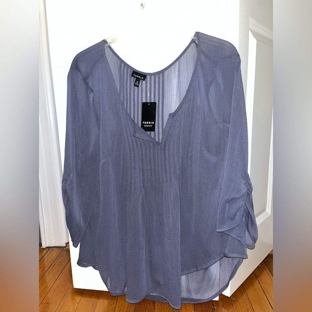 Sheer pale purple shirt